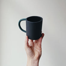 Load image into Gallery viewer, Black mug with green handle
